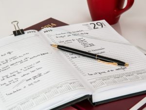 hand written calendar in a notebook