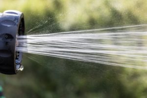 a hose spraying water